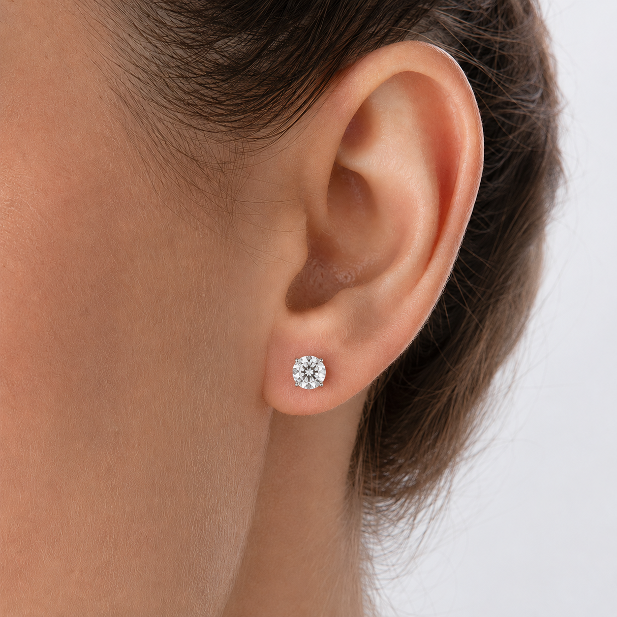 1ct diamond stud earring on ear